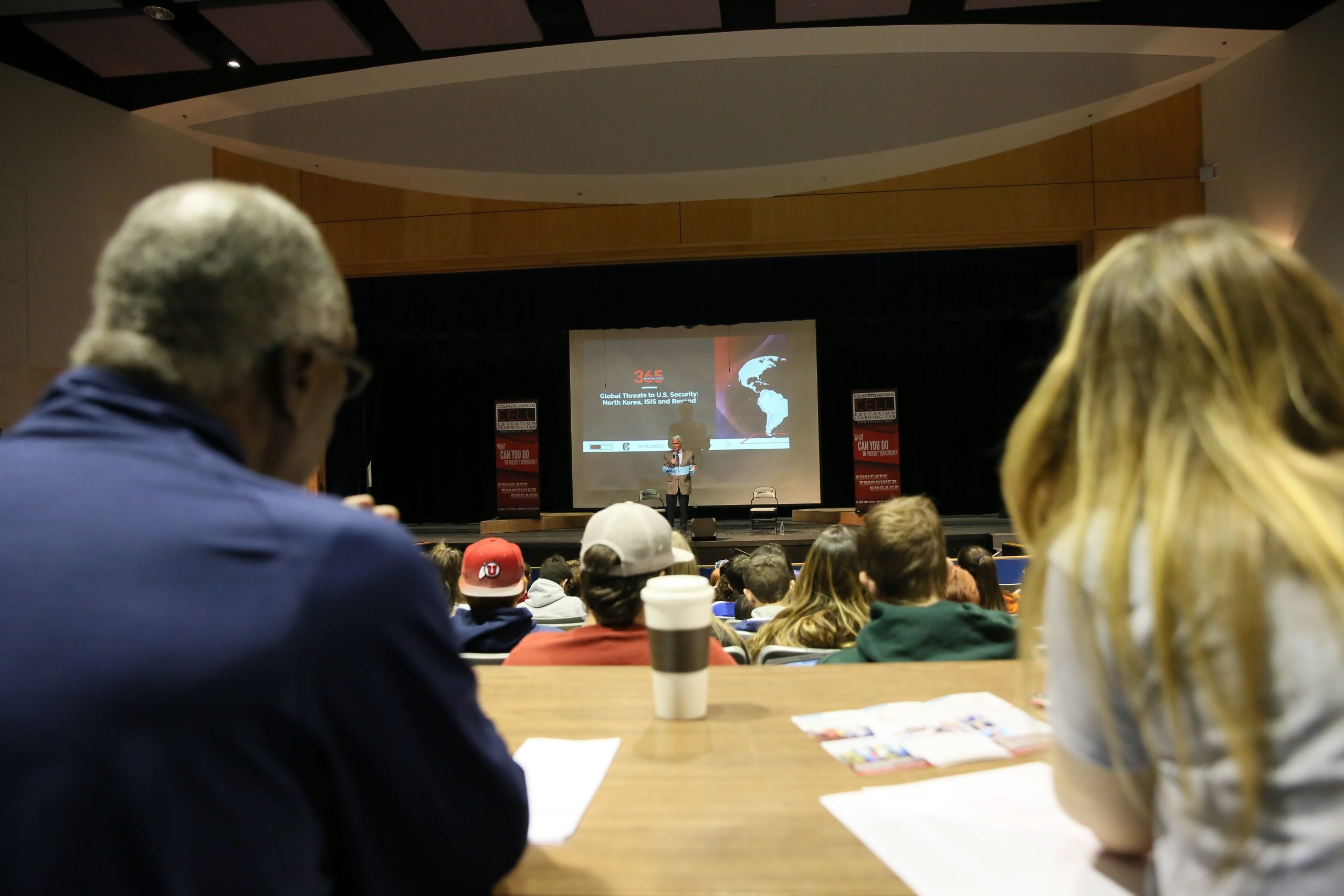 people listening to a speaker intently at the Counterterrorism Education Learning Lab